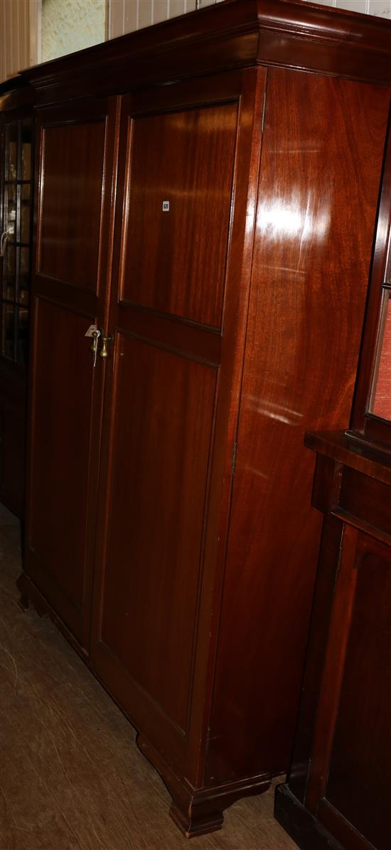 Mahogany compactum wardrobe by John Watts